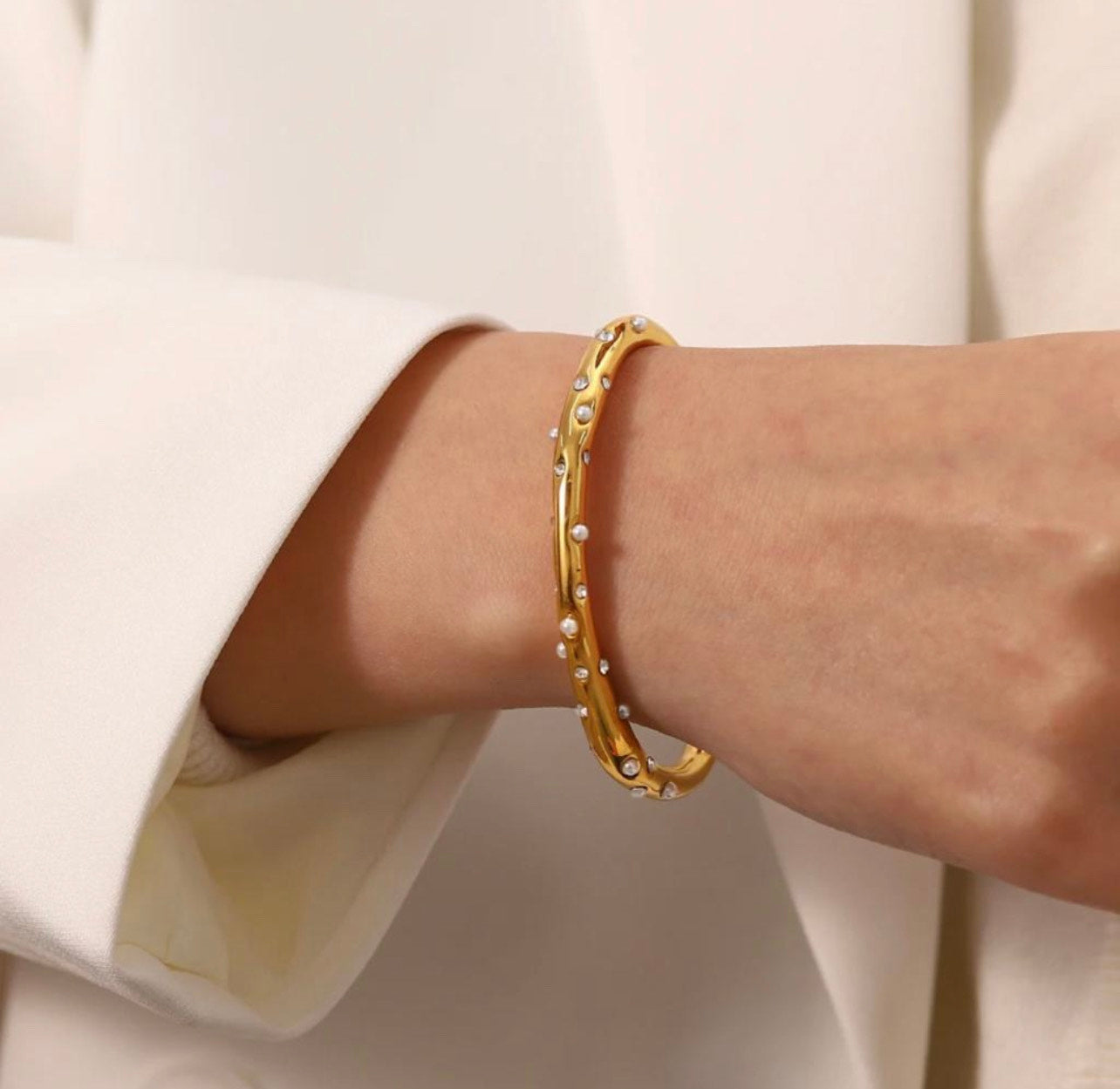 Dainty Pearl Bangle on a model